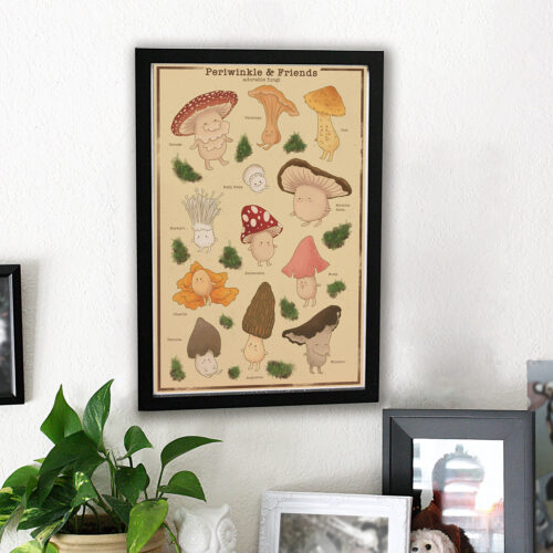 An 11x17" Periwinkle & Friends poster print, showing cute, smiling mushrooms, hangs on a white wall above a green plant and black-framed photos.