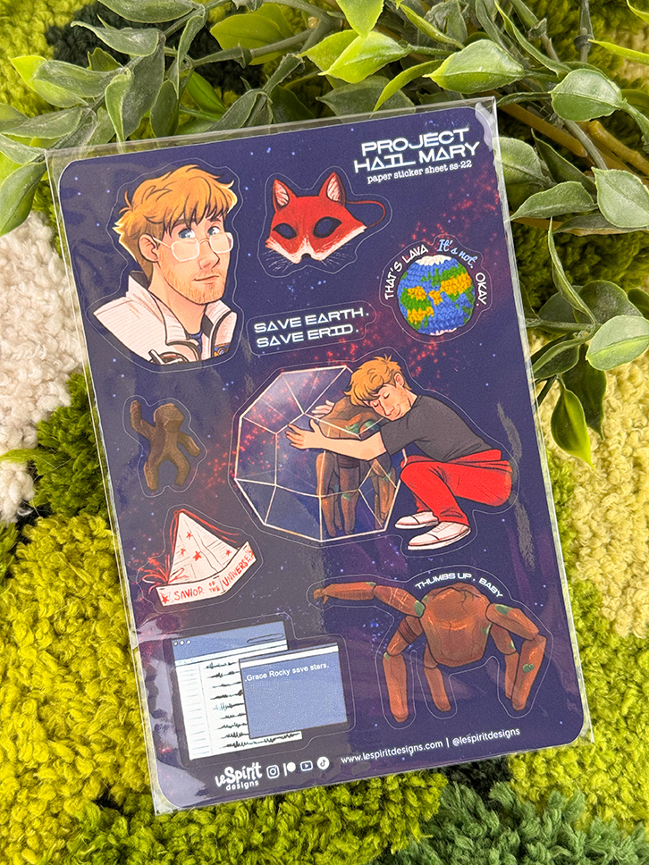A sheet of Project Hail Mary themed stickers, including a man, a fox mask, a hand, Earth, a rocky figure, a diagram, and a checklist, on a leafy background.