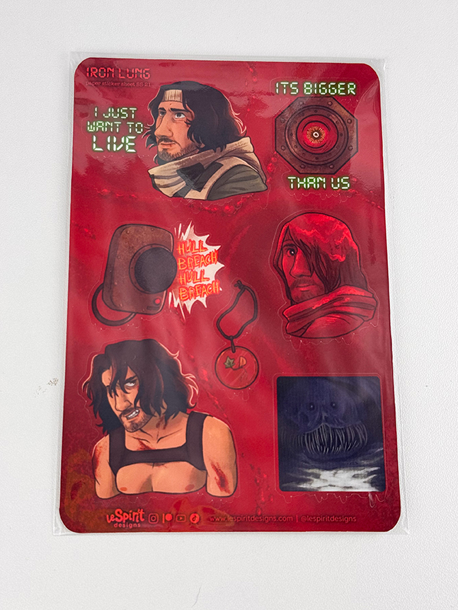 A sticker sheet featuring illustrated characters, phrases, and objects from the game Iron Lung, with red and dark tones and text like I just want to live and Its bigger than us..