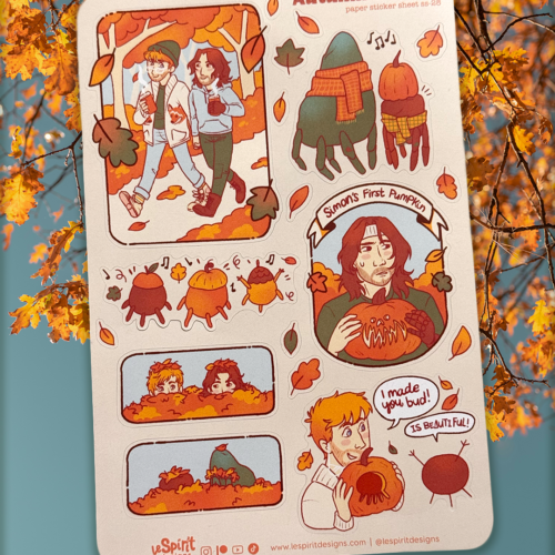 Witch Hat Babies ~ Paper Sticker Sheet featuring two people in an autumn forest, a person carving a pumpkin labeled Simons First Pumpkin, and various small illustrations of woodland creatures and pumpkins.